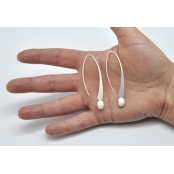 Longues boucles d\'oreille Blanc